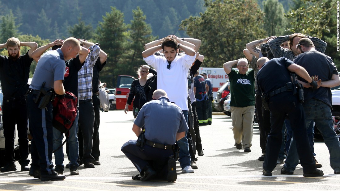 Police search students outside Umpqua Community College after &lt;a href=&quot;http://www.cnn.com/2015/10/01/us/gallery/oregon-shooting-umpqua-community-college/index.html&quot; target=&quot;_blank&quot;&gt;a deadly shooting&lt;/a&gt; at the school in Roseburg, Oregon, in October 2015. Nine people were killed and at least nine were injured, police said. The gunman, Chris Harper-Mercer, committed suicide after exchanging gunfire with officers, a sheriff said.