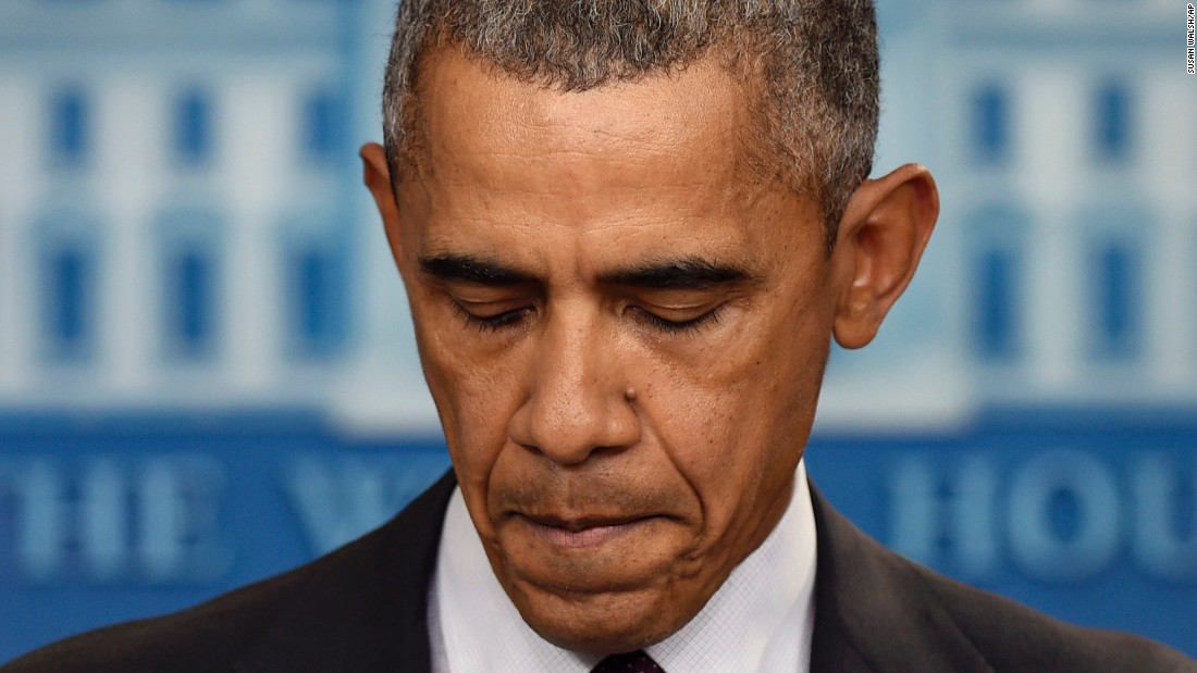 Obama pauses on October 1 during a news conference about the mass shooting at Umpqua Community College in Oregon.