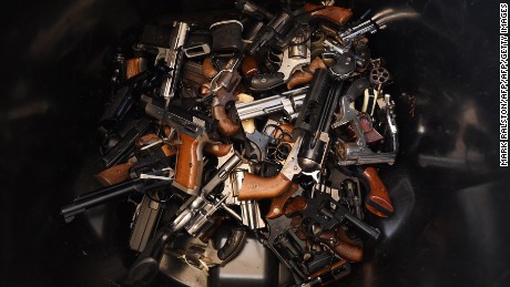 Handguns that were swapped for gift cards during a Los Angeles Police Department sponsored gun buyback event in Los Angeles, California on December 13, 2014.  The city held the event in three locations and the public were able safely and anonymously surrender firearms in exchange for $100 and $200 gift cards.    AFP PHOTO/MARK RALSTON        (Photo credit should read MARK RALSTON/AFP/Getty Images)