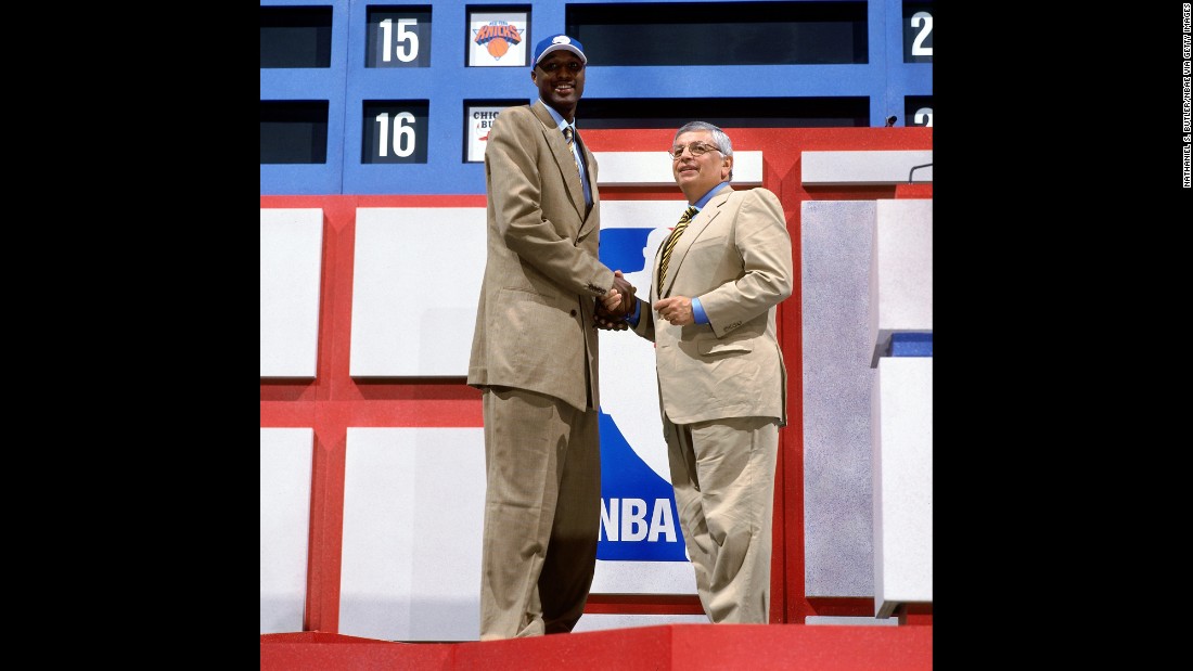 Odom shakes hands with NBA Commissioner David Stern during the 1999 NBA Draft. Odom was drafted by the Los Angeles Clippers.