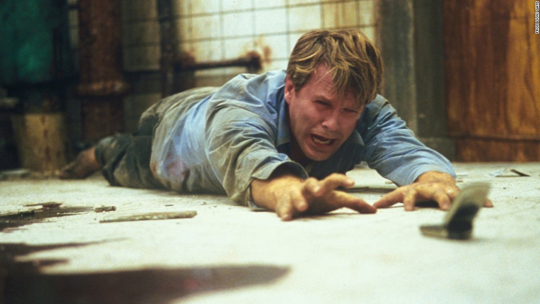 &quot;Saw&quot; brought mass-market horror films a new level of graphic intensity. In the 2004 film, two men are chained in a bathroom, with each directed to kill the other. Its success led to six sequels and other films determined to out-gross the last -- in more ways than one.