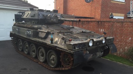 Jeff Woolmer&#39;s ex-army tank safely parked in his new driveway