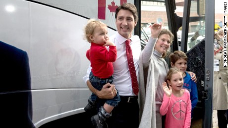 Canadian Liberal Party leader Justin Trudeau leaves after casting his ballot with his wife Sophie and their children Hadrien(L), Ella-Grace(2nd-R) and Xavier(R) in Montreal on October 19, 2015. The first of 65,000 polling stations opened Monday on Canada&#39;s Atlantic seaboard for legislative elections that pitted Prime Minister Stephen&#39;s Tories against liberal and social democratic parties. Up to 26.4 million electors are expected to vote in 338 electoral districts. Some 3.6 million already cast a ballot in advance voting a week ago, and the turnout Monday is expected to be high.   AFP PHOTO/NICHOLAS KAMM        (Photo credit should read NICHOLAS KAMM/AFP/Getty Images)
