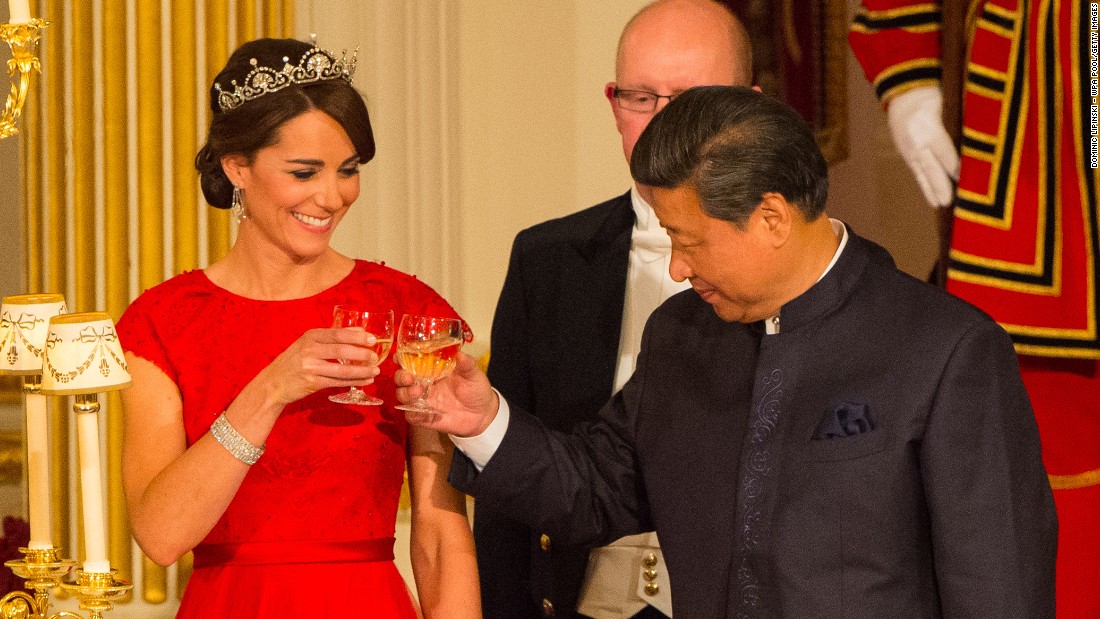 Xi and the Duchess of Cambridge raise their glasses at a state banquet at Buckingham Palace on Tuesday, October 20.