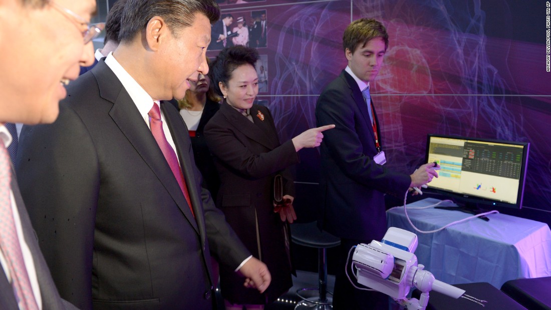 Xi and Peng inspect equipment at Imperial College&#39;s Hamlyn Centre for Medical Robotics.