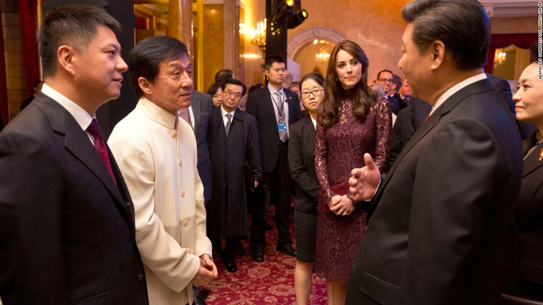 Xi chats with actor Jackie Chan, second left, and Catherine, Duchess of Cambridge, at Lancaster House in London on October 21.