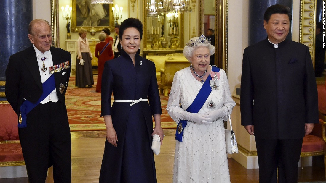 The Chinese leader and first lady join Queen Elizabeth II and Prince Philip at a state banquet on October 20.