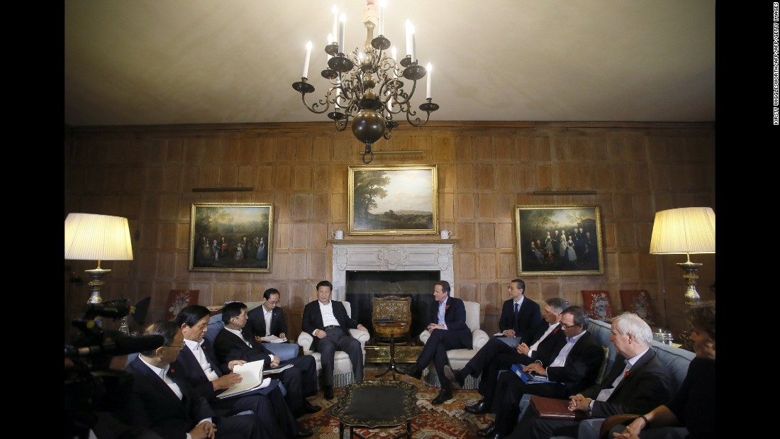 Cameron and Xi hold talks with their aides at Chequers, the Prime Minister&#39;s official country residence, on October 22. 