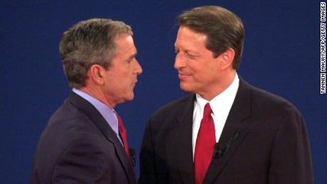 ST. LOUIS, UNITED STATES:  Republican presidential nominee George W. Bush (L) shakes hands with Democratic presidential nominee Al Gore after their third debate at Washington University in St. Louis, MO, 17 October, 2000. This is the last debate between the candidates before the 07 November election.    AFP PHOTO/Tannen MAURY (Photo credit should read TANNEN MAURY/AFP/Getty Images)