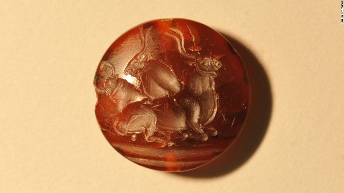 More than 40 intricately-designed seal stones from the more advanced Minoan culture on the nearby island of Crete were found in the tomb. Long-horned bulls and sometimes, human bull jumpers soaring over their horns, are a common motif in Minoan designs.