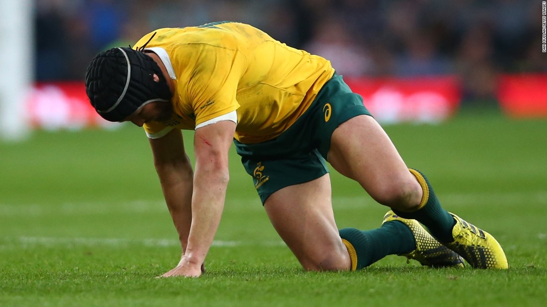 Matt Giteau of Australia made a sorry first half exit for the Wallabies after picking up an injury. 