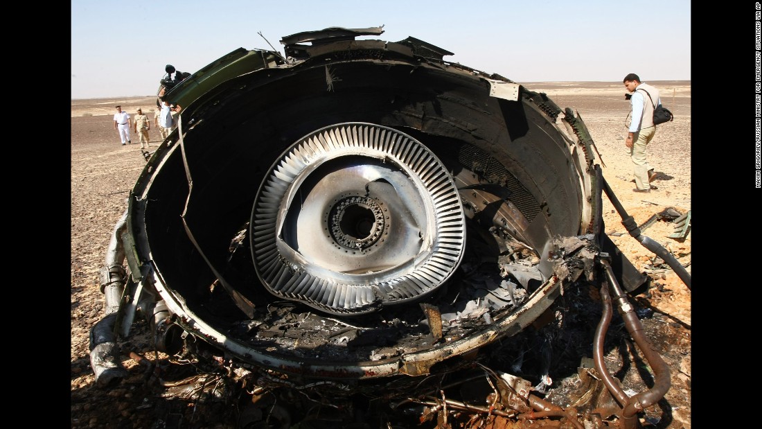 A piece of the engine sits on the ground at the crash site on November 1.