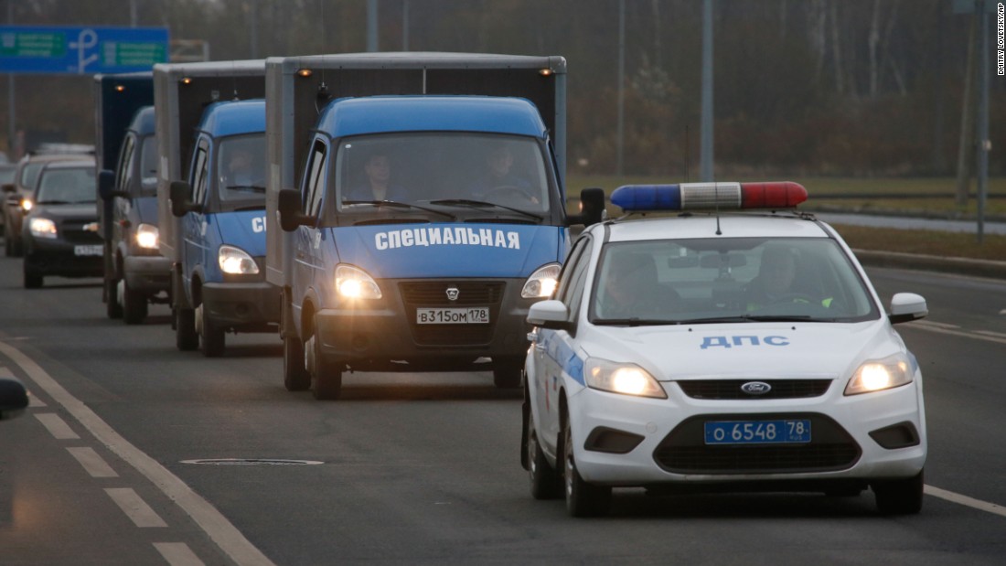 Trucks in St. Petersburg carry victims&#39; bodies on Monday, November 2.