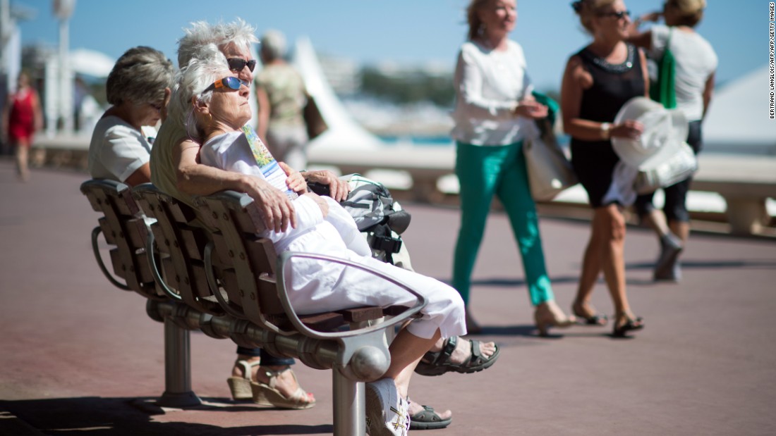 France also tied second with the other countries in southern Europe with, those over 60 living to the age of 85, on average. Pictured, a couple sit on a bench in Cannes.