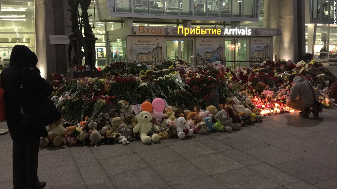 People visit a makeshift memorial at the airport in St. Petersburg on November 3.