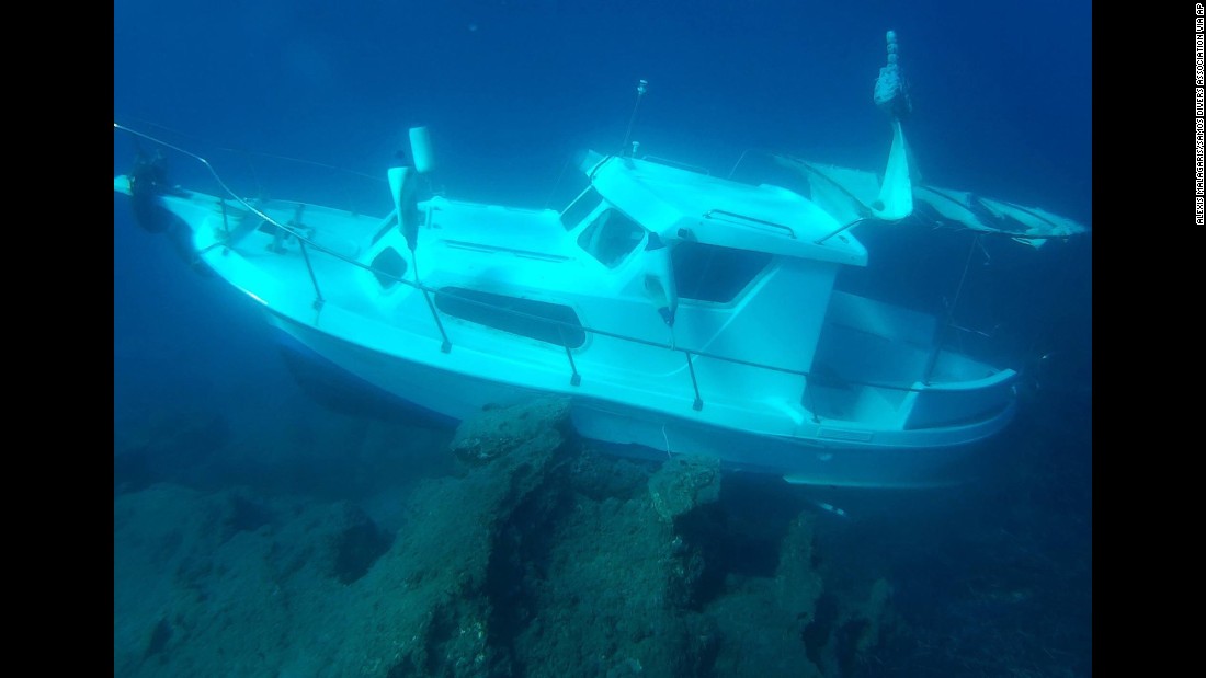 The Kusadasi Ilgun, a sunken 20-foot boat, lies in waters off the Greek island of Samos in November 2016. 