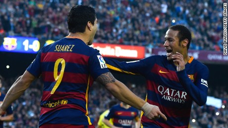 Luis Suarez celebrates with his teammate Neymar as the pair shared Barcelona&#39;s goals in the 3-0 win over Villarreal.