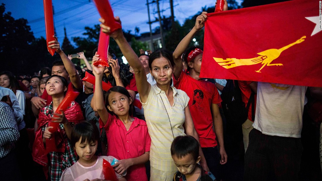 People rally outside the National League for Democracy office after Myanmar&#39;s first free and fair election in 25 years on November 8 in Yangon. 