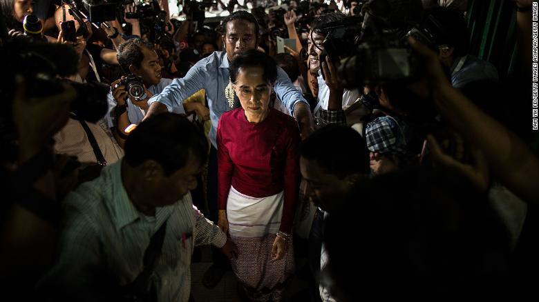 Suu Kyi arrives at a polling station to cast her vote in 2015. Her party won a historic majority in the nation's first freely held parliamentary elections. Suu Kyi was not able to become president, however, because of a constitutional amendment that prohibits anyone with foreign relatives from becoming the nation's leader. She was later named state counselor, a role created especially for her.