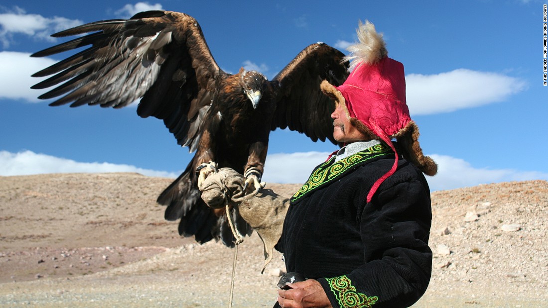 A Kazakh nomad with a Golden Eagle in the Altai Mountains in the western Mongolia. Locals have hunted with eagles for centuries.