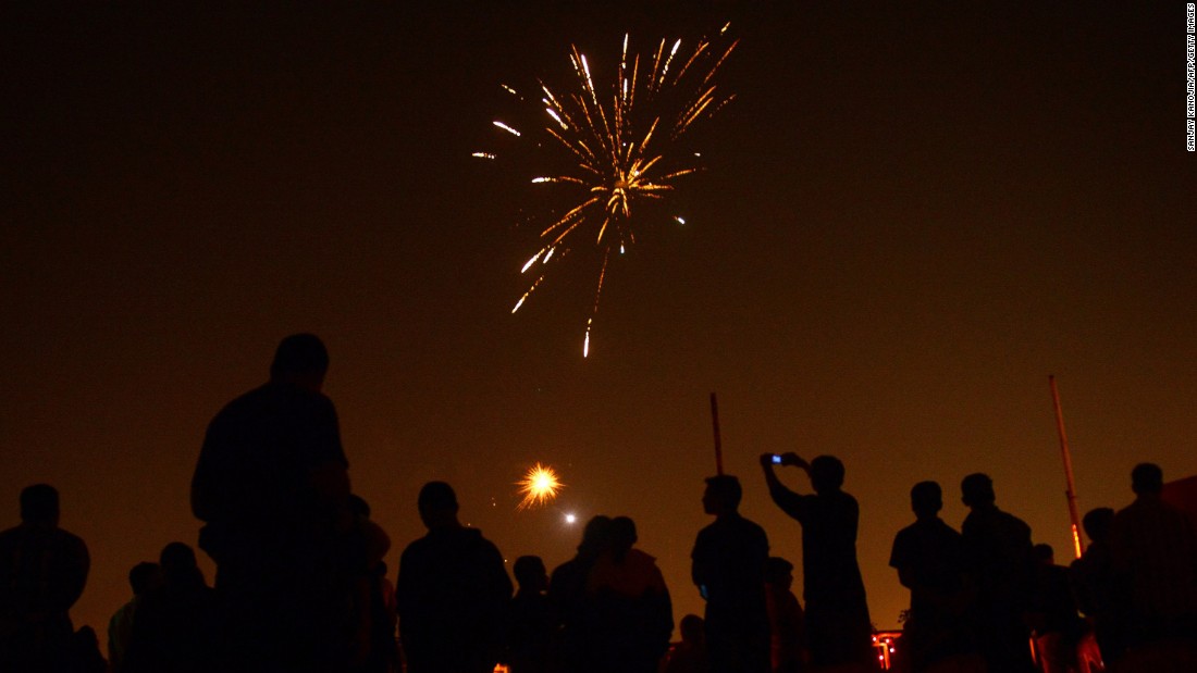 Athletes watch fireworks at the Madan Mohan Malviya Stadium in Allahabad, India, on November 10.