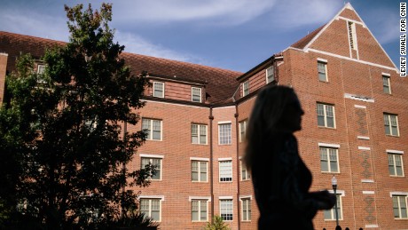 Mary stands in front of Wildwood Hall which is now located in the same location as the old Pike House on the Florida State University campus. Mary said it makes her feel better to know tha the Pike House were she was gang raped no longer exists. Mary returned to Florida State University for the first time in 25 years in an effor to complete the healing process after she was gang raped by Pi Kappa Alpha franternity brothers in 1988.