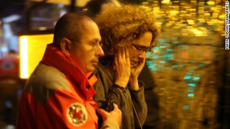 Nov. 14, 2015 - Paris, France - CORBIS OUT = Victims of the shooting at the Bataclan concert venue in central Paris are being evacuated to receive first aid. More than one hundred people were killed and many more wounded when gunmen opened fire inside the venue as the French capital has been the target of a series of deadly attacks. (Credit Image: © Maya Vidon-White via ZUMA Wire)
