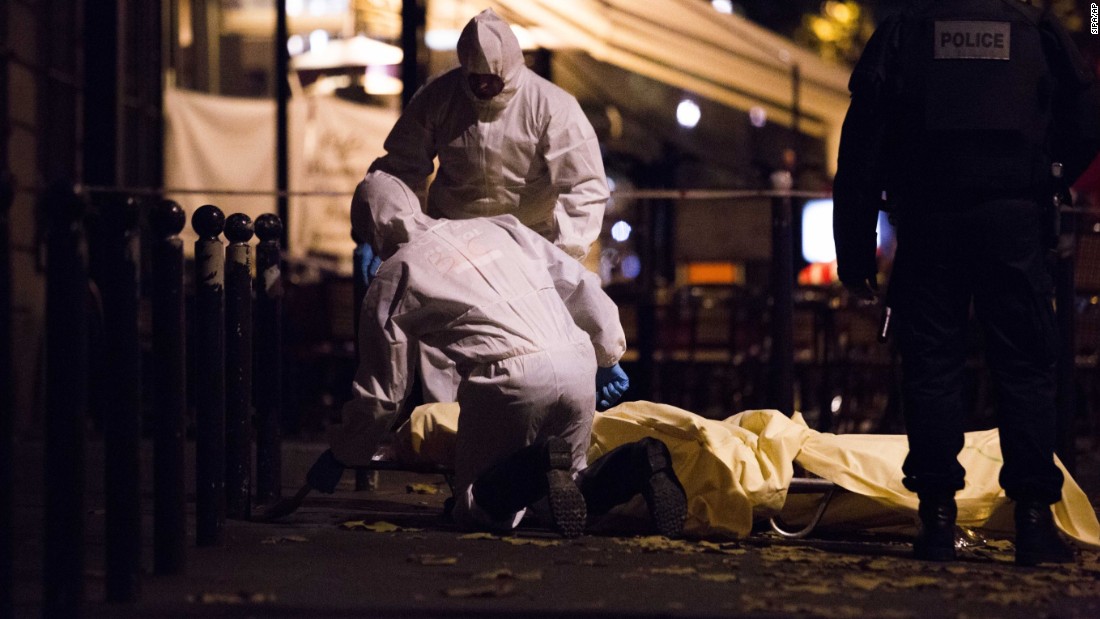 Forensics are working in the street of Paris after the terrorist attack on Friday, November 13.  The words &quot;horror,&quot; &quot;massacre&quot; and &quot;war&quot; peppered the front pages of the country&#39;s newspapers, conveying the shell-shocked mood.  