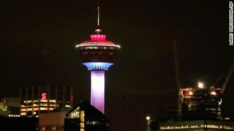 The Calgary Tower is lit up with the colors of the French flag to show support and sympathy for victims of the Paris attacks in Calgary, Alberta on November 13.