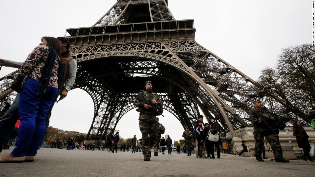 Soldiers patrol the Eiffel Tower on November 14.