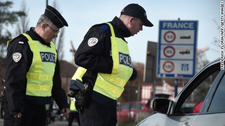 French Police officers carry out checks on vehicles on the &quot;European bridge,&quot; between Strasbourg and Kehl, on November 14,  as part of security measures in the wake of attacks in and around Paris. 