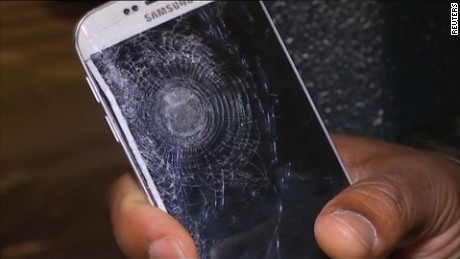 paris attack survivor cell phone saved shrapnel sot_00000000.jpg