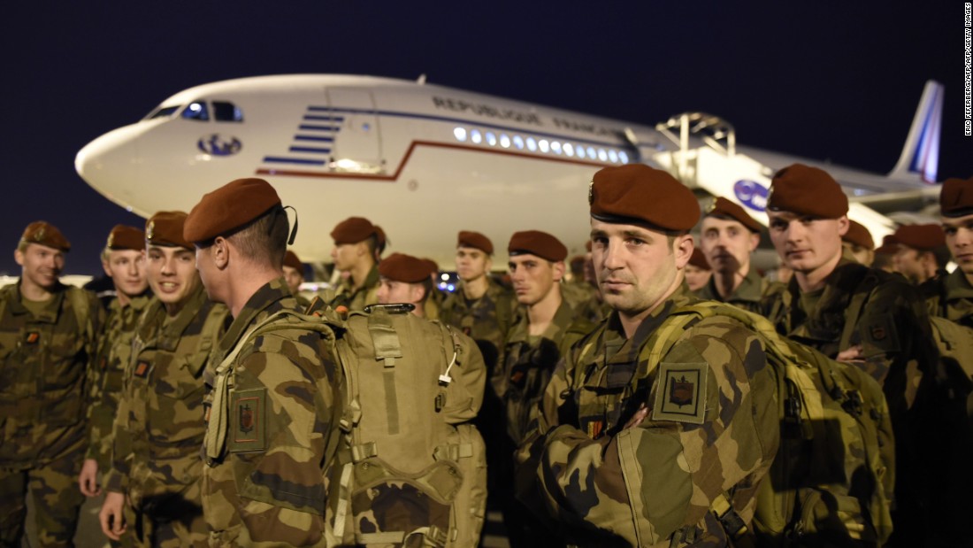 Soldiers from the 3rd Marine Infantry Parachute Regiment of Carcassonne arrive at Charles de Gaulle Airport in Paris as security reinforcements on November 14. 