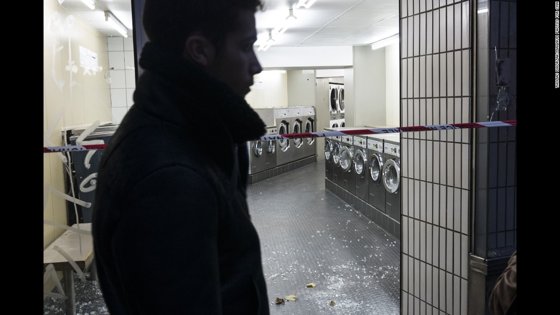 The windows of a laundromat on the Rue de la Fontaine au Roi were blown out in the attacks.