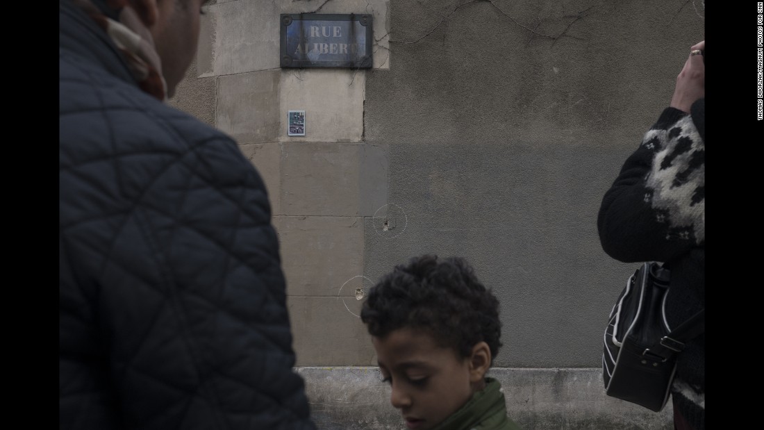 Bullet holes are circled on a wall near Le Petit Cambodge on November 14.