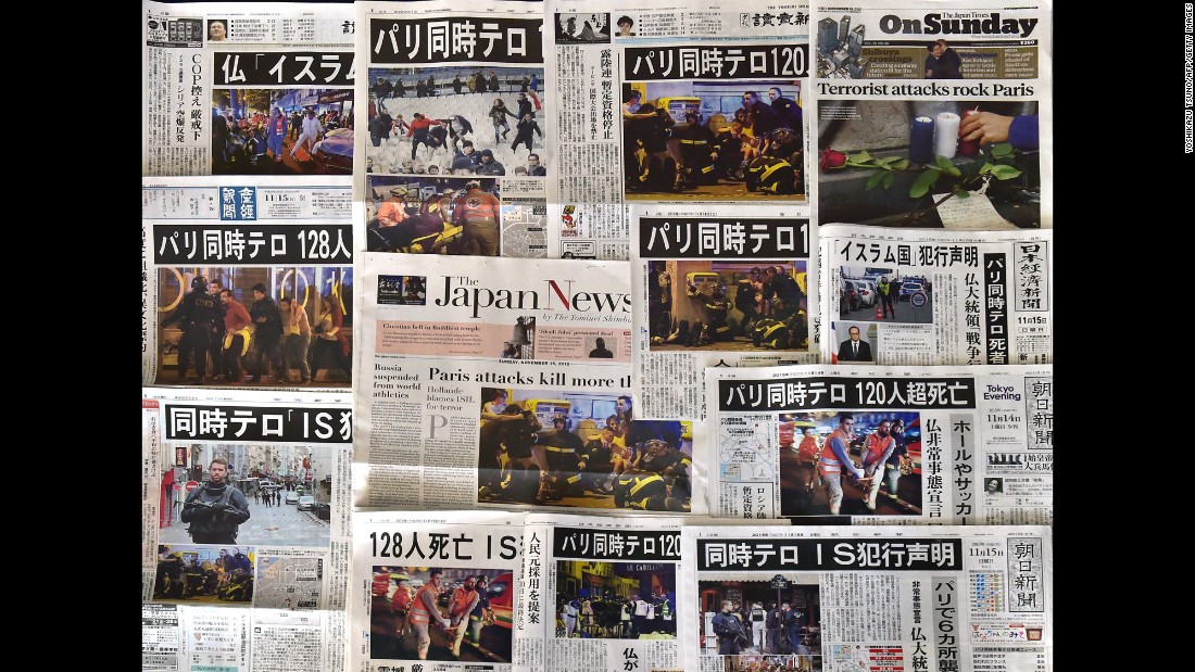 Front pages of Japanese newspapers in Tokyo show coverage and photos of the Paris attacks on November 14.