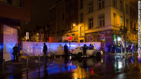 Belgian police cordon off a street during a police raid in connection with the November 13 deadly attacks in Paris, in Brussels&#39; Molenbeek district on November 14, 2015. Several people were arrested in Brussels on November 14 during police raids connected to the attacks in Paris, Belgian Justice Minister Koen Geens said. Geens said on RTBF television that these arrests in the capital&#39;s Molenbeek neighbourhood &quot;can be seen in connection with a grey Polo car rented in Belgium&quot; found near the concert hall in the French capital where scores of people were killed. AFP PHOTO / BELGA / JAMES ARTHUR GEKIERE = BELGIUM OUT =        (Photo credit should read JAMES ARTHUR GEKIERE/AFP/Getty Images)