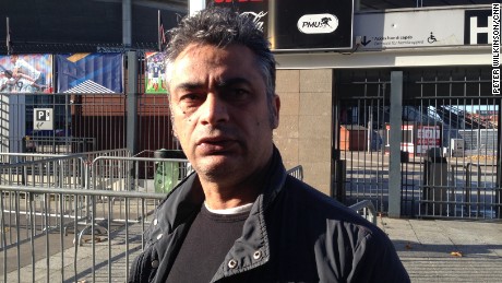 Kevin Tulga, pictured, was walking through the entrance of the Stade de France with his 10-year-old son when the bomber detonated behind him. 