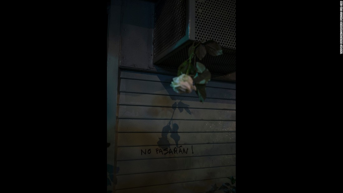 &quot;No passaran!&quot; is scrawled on a wall near the Bataclan music venue on November 15. The phrase translates roughly to &quot;thou shall not pass&quot; and refers to standing firm in the face of an enemy. 
