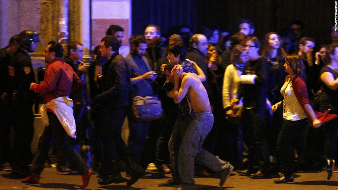 Wounded people are helped outside the Bataclan concert hall in Paris following a series of coordinated attacks in the city on Friday, November 13. The militant group ISIS claimed responsibility &lt;a href=&quot;http://www.cnn.com/2015/11/13/world/gallery/paris-attacks/index.html&quot; target=&quot;_blank&quot;&gt;for the attacks,&lt;/a&gt; which killed at least 130 people and wounded hundreds more.