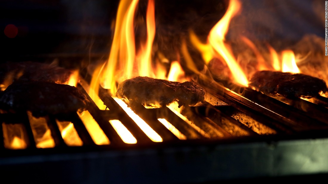 The uncontrollable heat and flames of a barbecue sometimes lead to uncooked burgers; always make sure they are well-done to avoid an upset stomach.