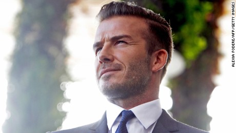 Former  England and Manchester United star, David Beckham during a press conference at the Perez Art Museum Miami, in Miami, Florida on February 5, 2014. Beckham said Wednesday that he will buy a US team to play Major League Soccer and bring it to Miami, confirming the worst-kept secret in world football. Beckham spoke to reporters alongside MLS commissioner Don Garber(L), who said Beckham and the league would work with Miami Dade county to build a world-class downtown stadium for the new club. AFP PHOTO / Alexia FODERE        (Photo credit should read Alexia Fodere/AFP/Getty Images)