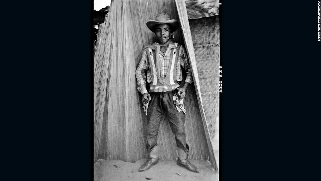 Bill and photographer Jean Depara made Kinshasa his canvas in the 1950s, capturing cowboys like Andrada in the urban neighborhoods they staunchly defended. Depara was an erstwhile shoemaker until 1953, first taking up the camera at his wedding in 1950, when he bought a small  Adox camera to record the occasion. His lens would go on to detail myriad examples of pop culture in the bubbling metropolis, but his series on the Bills is among his most famous.