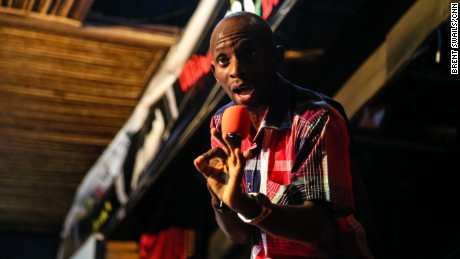 Pentecostal pastor David Ssebuguzi preaches during a Tuesday service in Kampala.