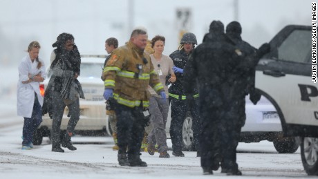 COLORADO SPRINGS, CO - NOVEMBER 27:  Hostages are escorted to an ambulance during an active shooter situation near a Planned Parenthood facility where an unidentified suspect has reportedly injured up to nine people, including at least four police officers, on November 27, 2015 in Colorado Springs, Colorado. A standoff has developed outside the clinic and the area is on lockdown. (Photo by Justin Edmonds/Getty Images)