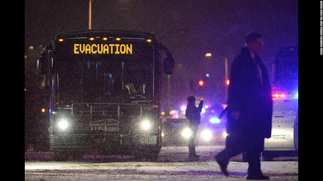 A bus of evacuees make its way towards neighboring hospitals.