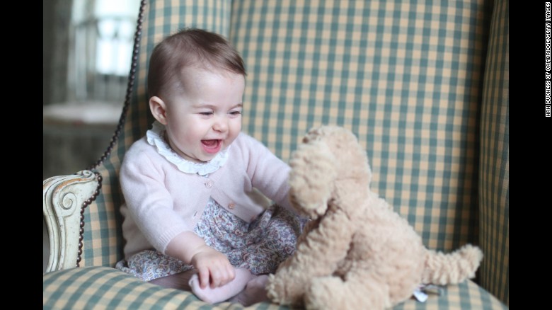 Princess Charlotte plays with a stuffed dog in this photo taken by her mother in November 2015.
