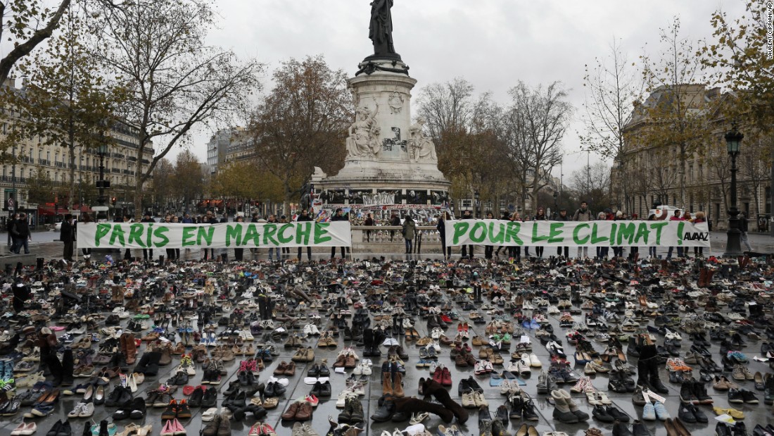 Hundreds of pairs of shoes are displayed at the Place de la République.