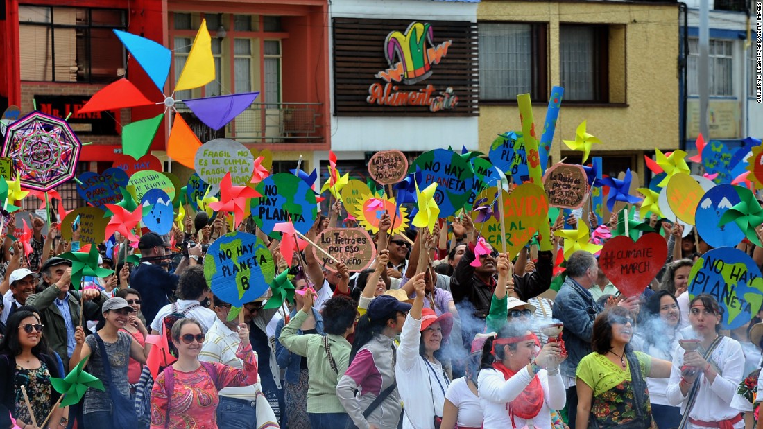 People take part in the Global Climate March in Bogota, Colombia.