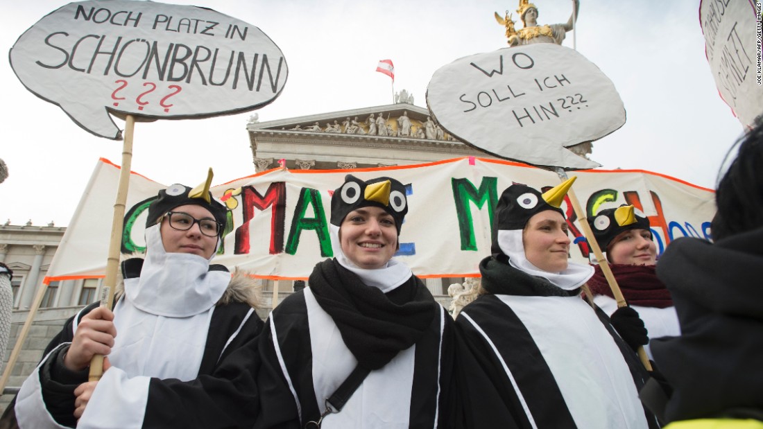 Protesters wearing penguin costumes march in Vienna, Austria.